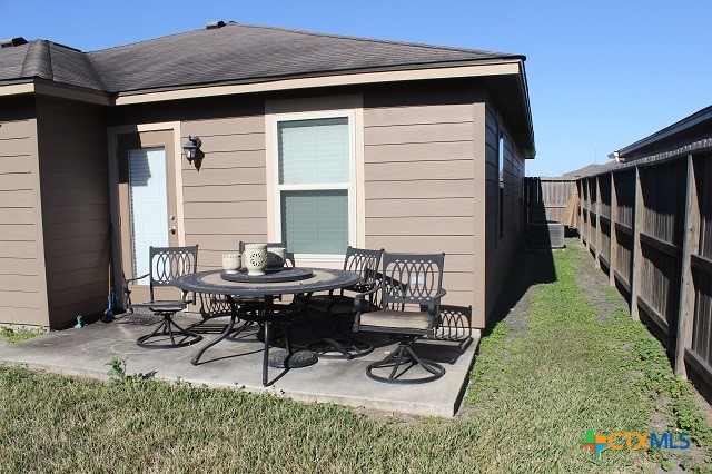 3009 Lenora Drive Victoria, TX 77901 - Photo 22 of 25 a view of a backyard with table and chairs