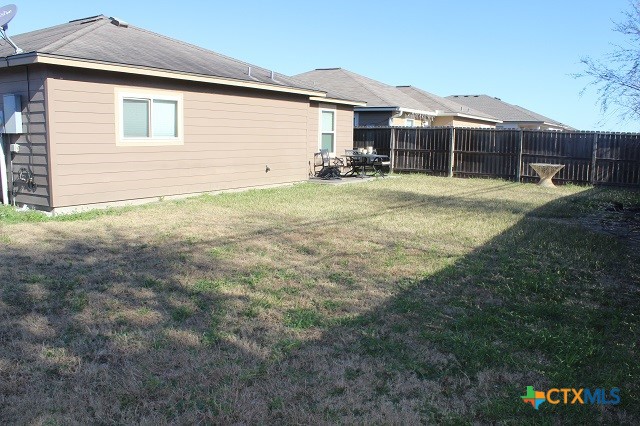 3009 Lenora Drive Victoria, TX 77901 - Photo 25 of 25 a front view of a house with a yard and garage