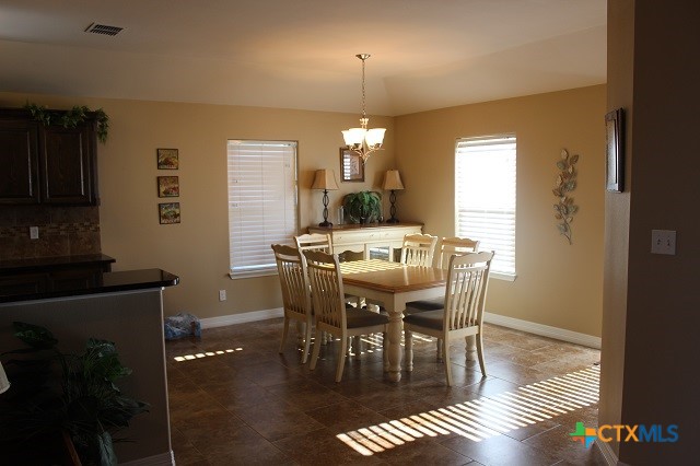 3009 Lenora Drive Victoria, TX 77901 - Photo 9 of 25 a view of a dining room with furniture and window