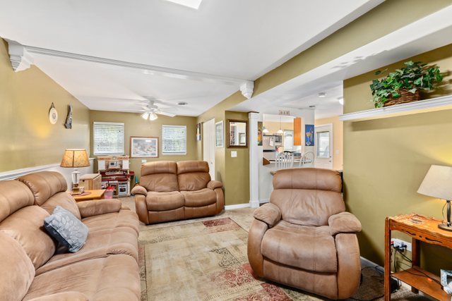 1S225 Valley Road Lombard, IL 60148 - Photo 19 of 46 a living room with furniture and a large window