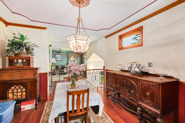 1S225 Valley Road Lombard, IL 60148 - Photo 5 of 46 a view of a dining room with furniture window and wooden floor
