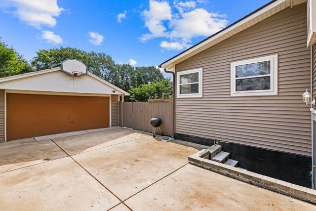 1S225 Valley Road Lombard, IL 60148 - Photo 42 of 46 a backyard of a house with table and chairs