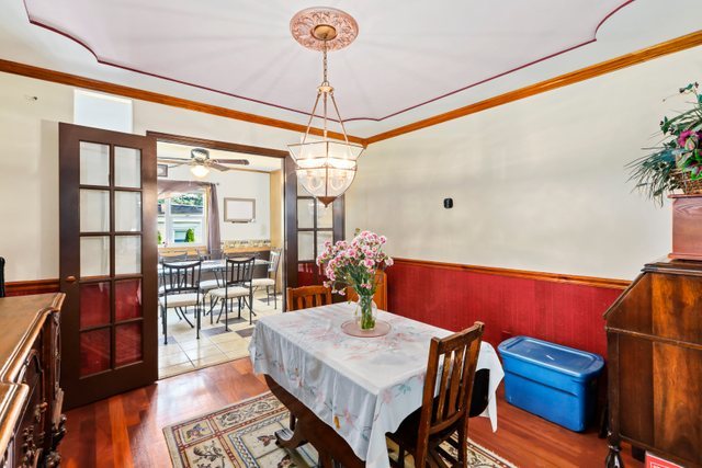 1S225 Valley Road Lombard, IL 60148 - Photo 6 of 46 a view of a dining room with furniture window and wooden floor
