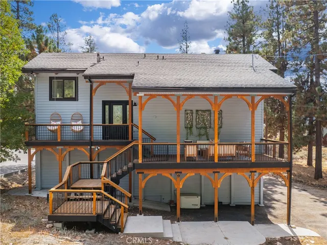 a view of a car park in front of house