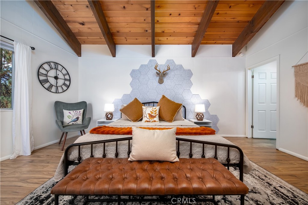 39651 Flicker Road Fawnskin, CA 92333 - Photo 16 of 58 a room with furniture and wooden floor