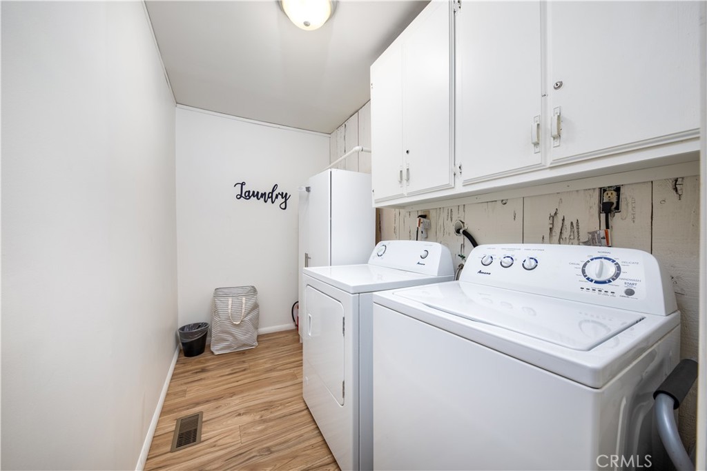 39651 Flicker Road Fawnskin, CA 92333 - Photo 20 of 58 a utility room with dryer and washer