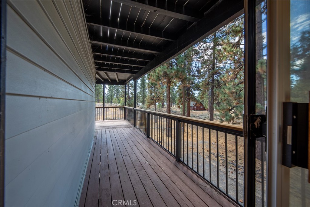 39651 Flicker Road Fawnskin, CA 92333 - Photo 39 of 58 a view of balcony with wooden floor