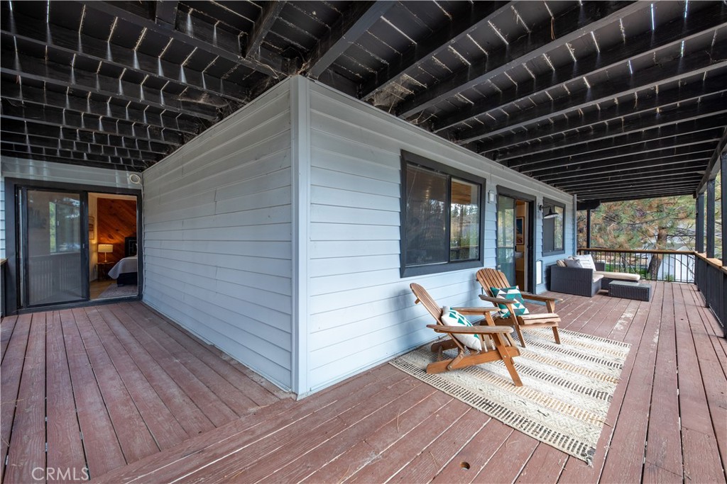39651 Flicker Road Fawnskin, CA 92333 - Photo 40 of 58 a view of a backyard with sitting area