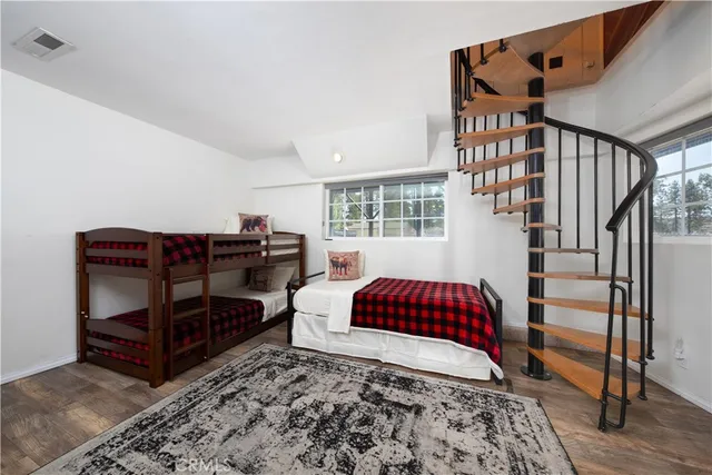 a view of house with outdoor space and sitting area