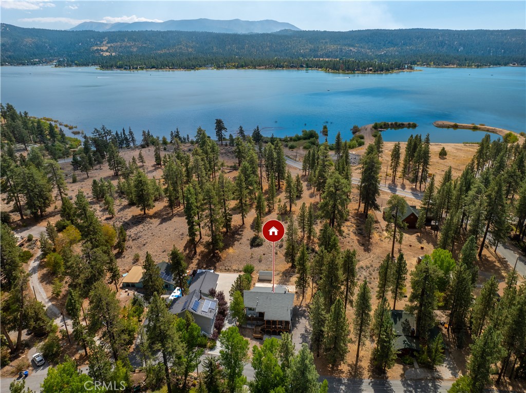39651 Flicker Road Fawnskin, CA 92333 - Photo 52 of 58 a view of a lake with a mountain