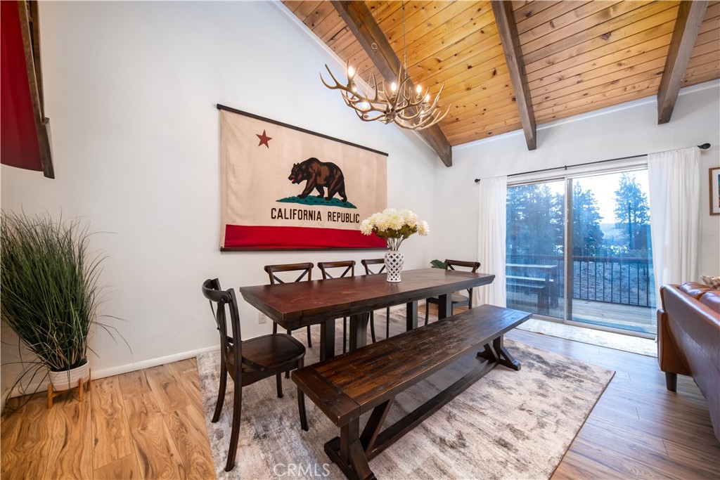39651 Flicker Road Fawnskin, CA 92333 - Photo 8 of 58 a view of a room with furniture wooden floor and window