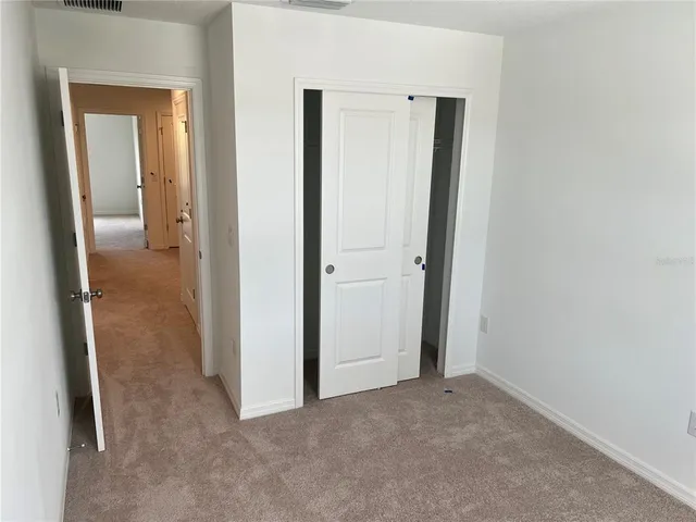 an empty room with closet