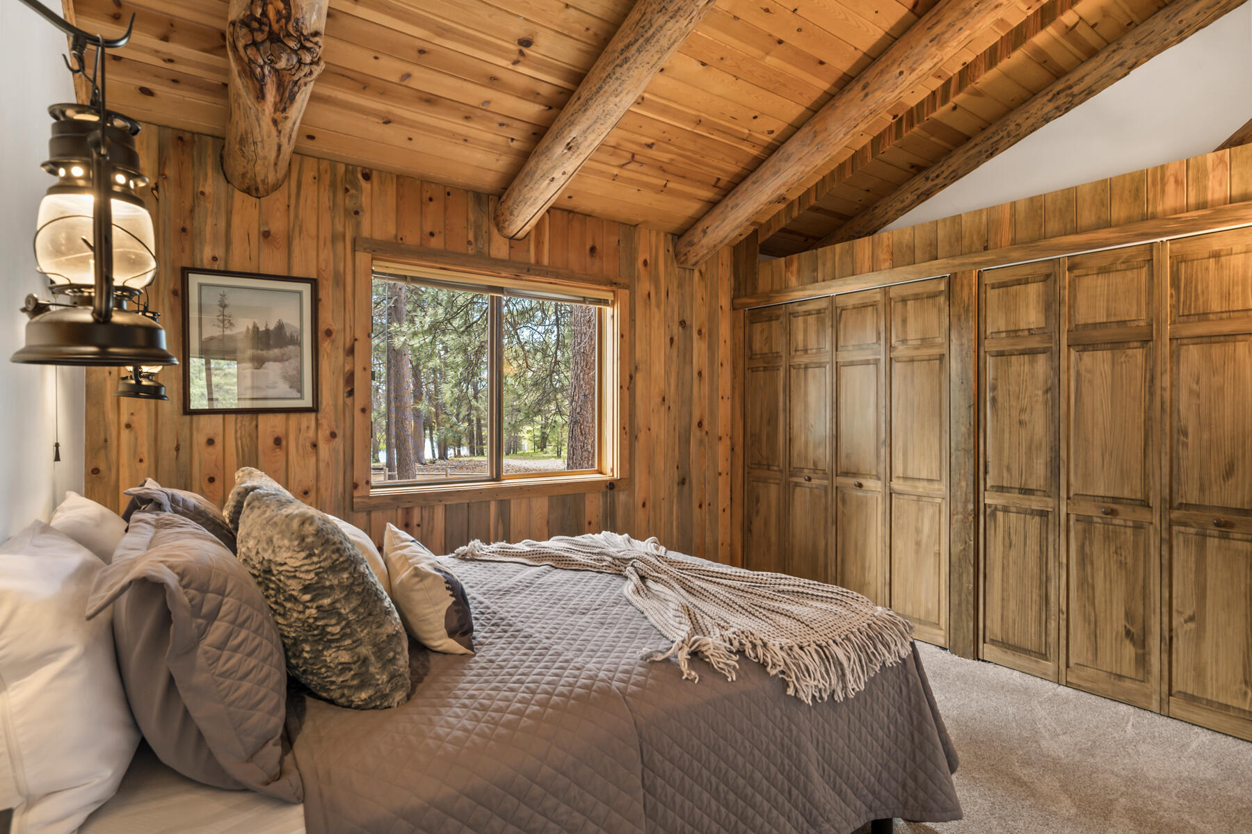 17026 Sharp Drive Bend, OR 97707 - Photo 43 of 72 a bed sitting in a bedroom next to a window