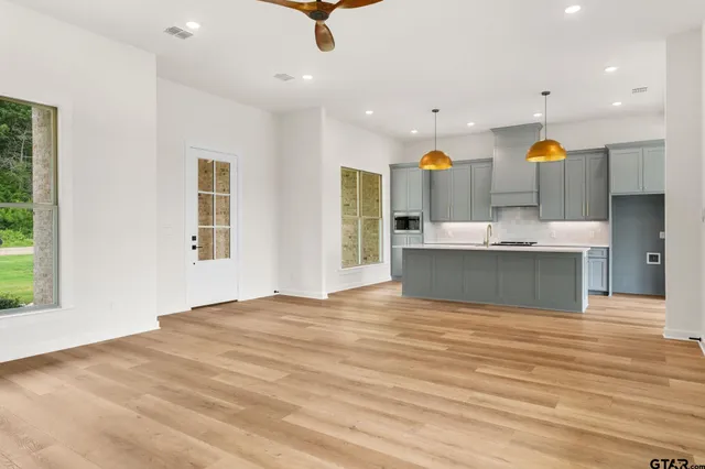 a view of kitchen sink and natural light