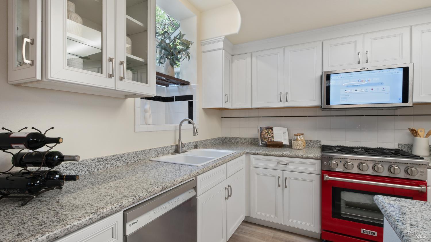 17867 Deer Hill Road Hidden Valley Lake, CA 95467 - Photo 14 of 53 a kitchen with granite countertop a sink and cabinets