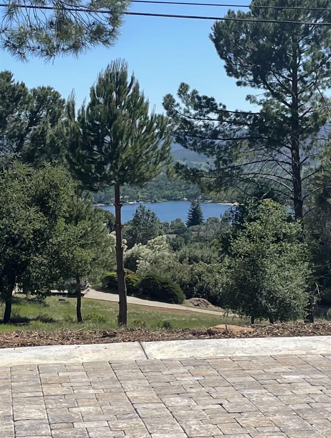 17867 Deer Hill Road Hidden Valley Lake, CA 95467 - Photo 16 of 53 a view of a road with a tree
