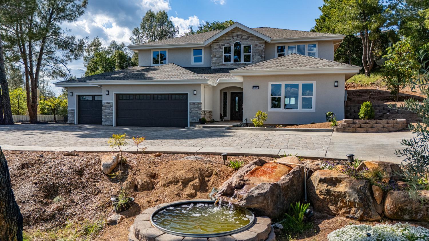 17867 Deer Hill Road Hidden Valley Lake, CA 95467 - Photo 2 of 53 a front view of a house with a yard