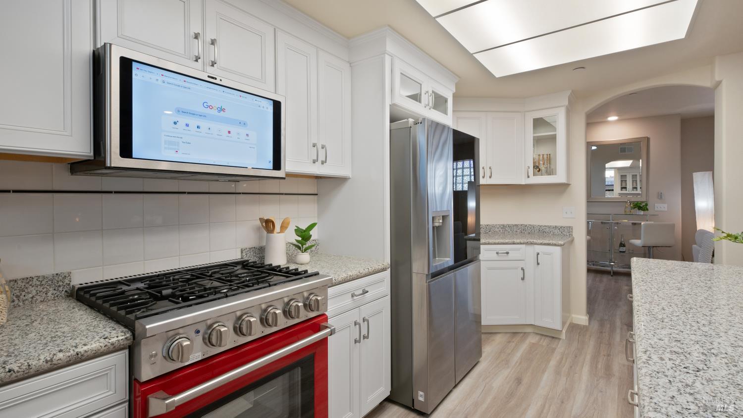 17867 Deer Hill Road Hidden Valley Lake, CA 95467 - Photo 23 of 53 a kitchen with a stove and a refrigerator