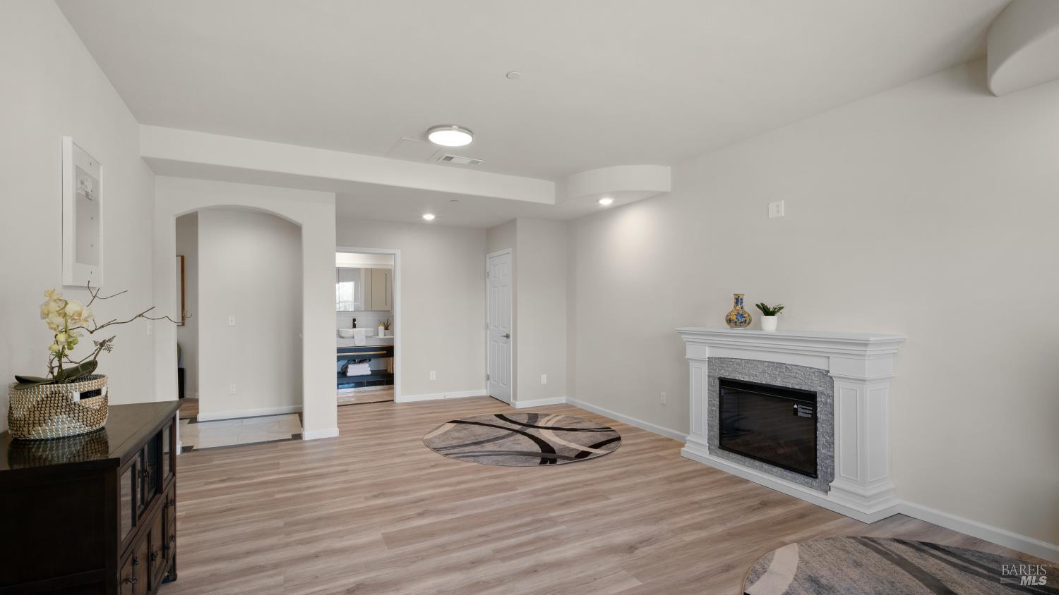 17867 Deer Hill Road Hidden Valley Lake, CA 95467 - Photo 24 of 53 a living room with furniture and a fireplace