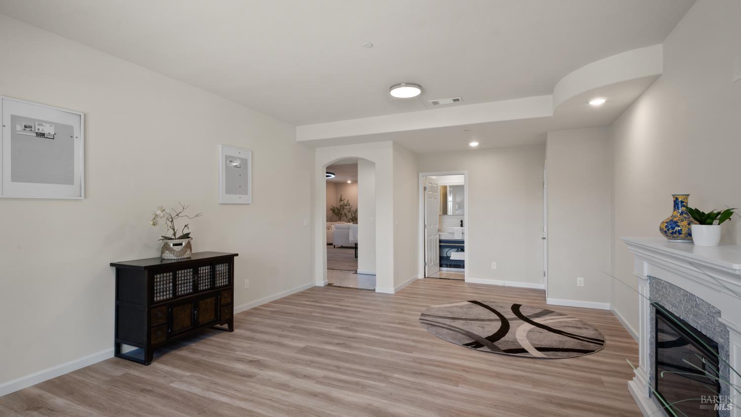 17867 Deer Hill Road Hidden Valley Lake, CA 95467 - Photo 26 of 53 a living room with furniture and a fireplace