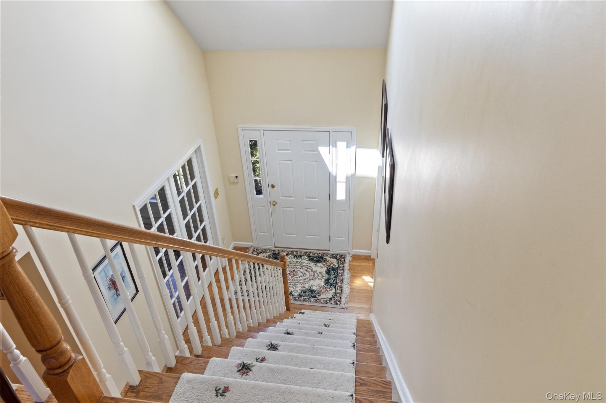 214 West Mombasha Road Monroe, NY 10950 - Photo 26 of 43 a view of staircase with railing and white walls