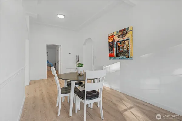 a kitchen with appliances cabinets and a window