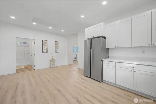 a bedroom with a bed and a fireplace