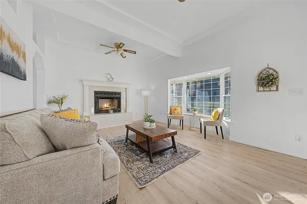 a dining room with furniture and window