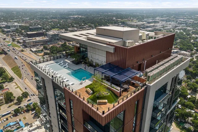 an aerial view of a house with a ocean view
