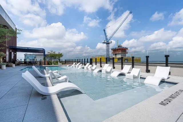 a view of a patio with swimming pool