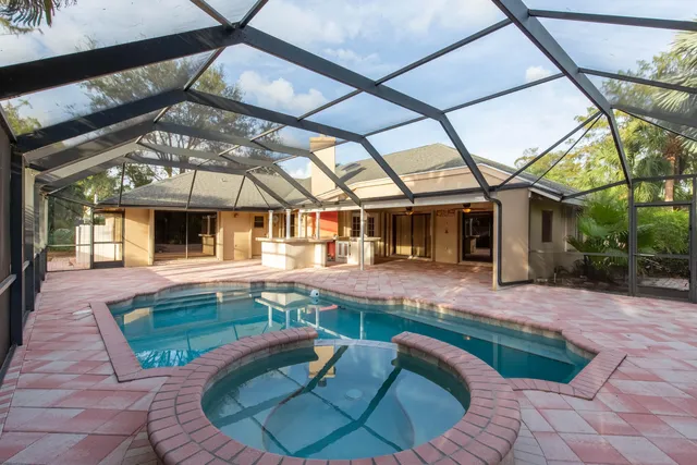 a view of a house with backyard
