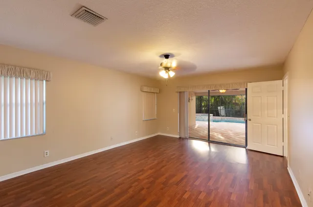 a view of a livingroom with wooden floor