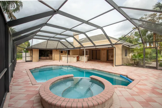 a view of a house with swimming pool