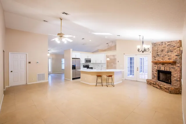 a view of a livingroom with furniture and a fireplace