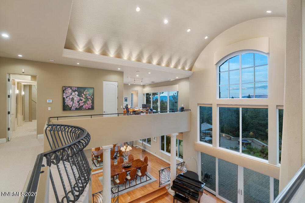 6065 Lake Geneva Drive Reno, NV 89511 - Photo 20 of 101 a view of a hallway with furniture and a large window