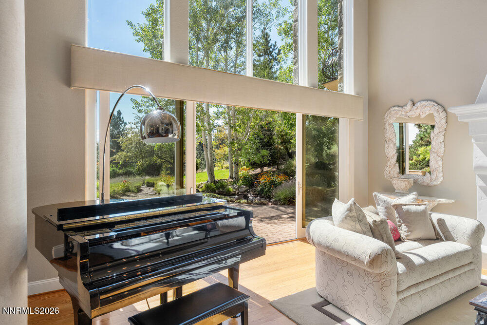 6065 Lake Geneva Drive Reno, NV 89511 - Photo 21 of 101 a living room with furniture and a window