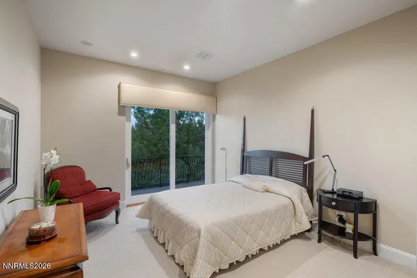 a view of a lake with a tree