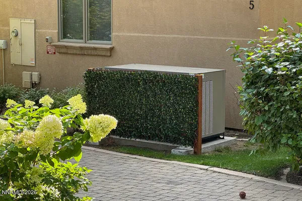 a view of a back yard of the house