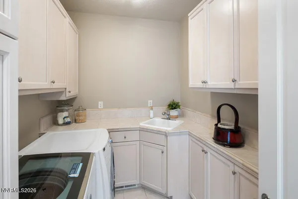 a view of a house with a yard and garden