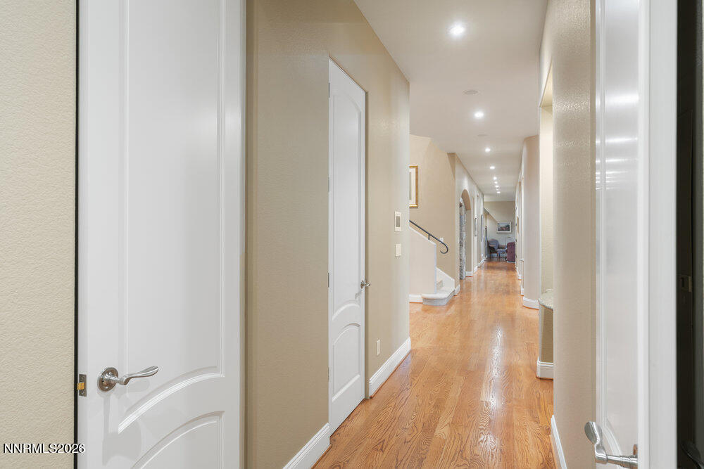 6065 Lake Geneva Drive Reno, NV 89511 - Photo 60 of 101 a view of a bathroom from a hallway