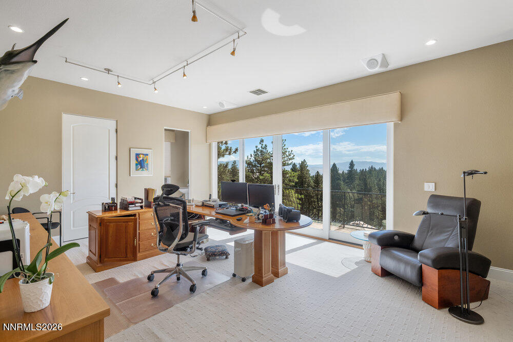 6065 Lake Geneva Drive Reno, NV 89511 - Photo 64 of 101 a living room with furniture and a large window