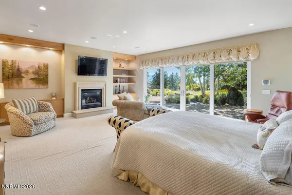 a view of a garden with a building in the background