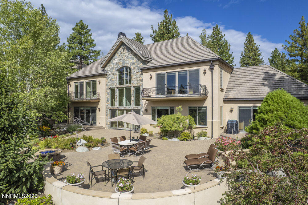 6065 Lake Geneva Drive Reno, NV 89511 - Photo 90 of 101 a view of a house with a yard and sitting area