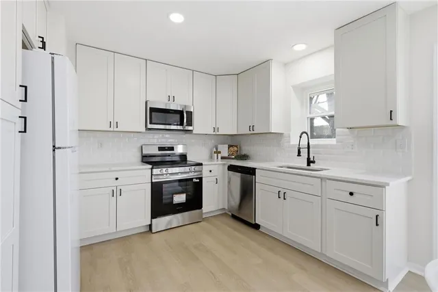 $325,000 | 310 North Darrowby Drive, Raymore, MO 64083