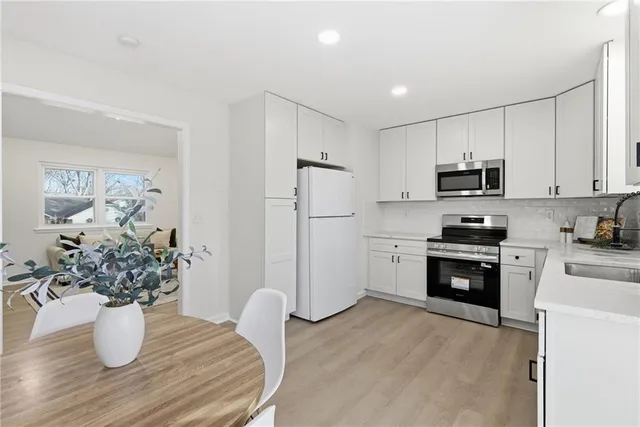 $325,000 | 310 North Darrowby Drive, Raymore, MO 64083