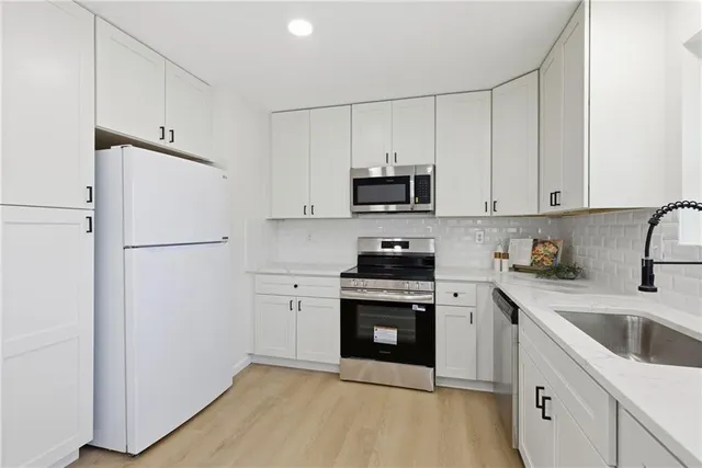 $325,000 | 310 North Darrowby Drive, Raymore, MO 64083