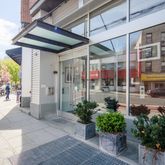 a view of a building with a potted plant