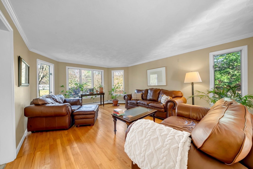 315 Candlestick Road North Andover, MA 01845 - Photo 20 of 42 a living room with furniture and a large window