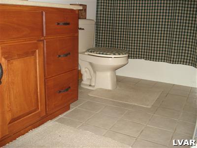 500 Point Phillips Road Bath, PA 18014 - Photo 18 of 31 a bathroom with a toilet and a shower