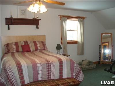 500 Point Phillips Road Bath, PA 18014 - Photo 19 of 31 a bedroom with a bed and window